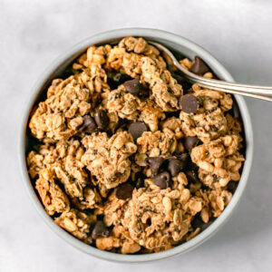 top shot of peanut butter granola with chocolate chips in a bowl