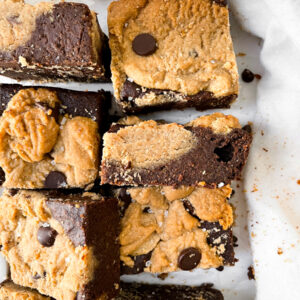 vegan brookies cut into squares topped with sea salt
