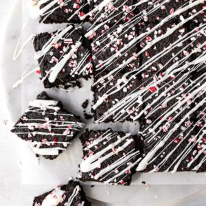 peppermint brownies sliced into squares on parchment paper