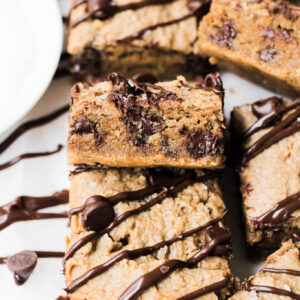 gluten free paleo blondie squares on parchment paper