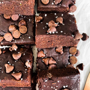a batch of no bake date bars with chocolate chips on top