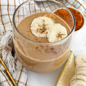 side view of a protein shake made with pumpkin