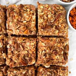 baked carrot cake oatmeal sliced into squares after cooling
