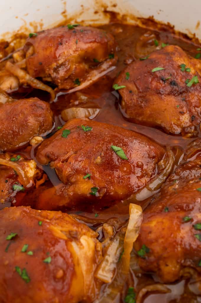 barbecue chicken in the slow cooker with onions.