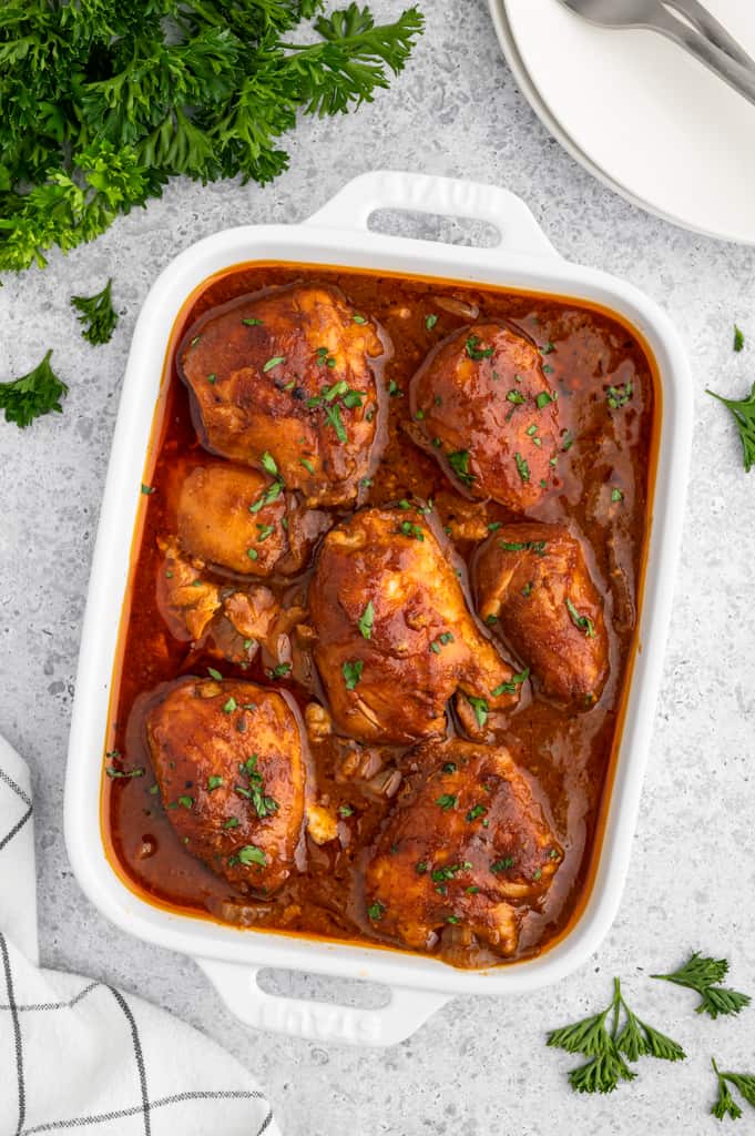 bbq chicken in a white serving dish.